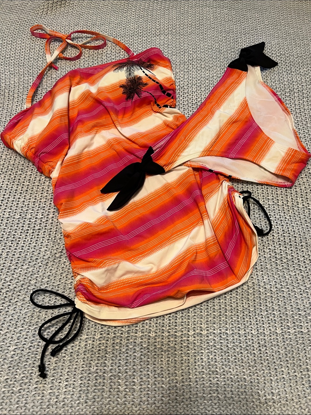 Vibrant Striped Tankini Set with Black Bow Accents
